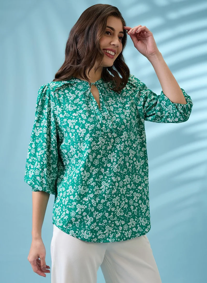 globus Globus Women Green Tie-Up Neck Puff Sleeves Floral Print Curved Hem Top