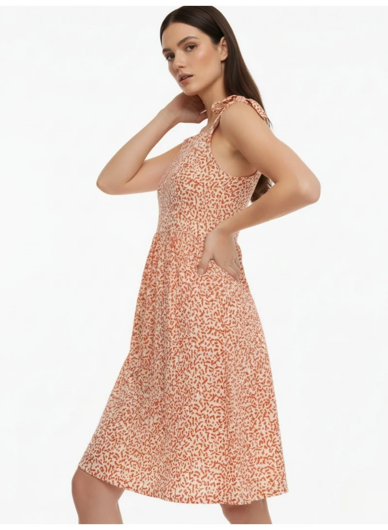 Outzidr  Red Printed Tied Up Mini Dress for Women | Best Price UAE