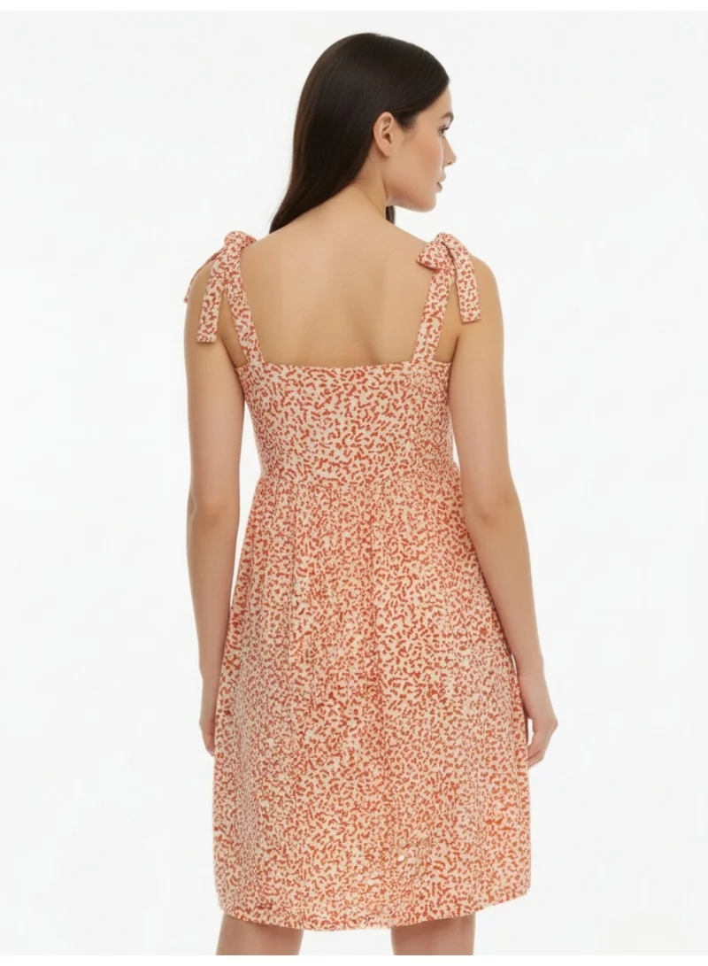 Outzidr  Red Printed Tied Up Mini Dress for Women | Best Price UAE