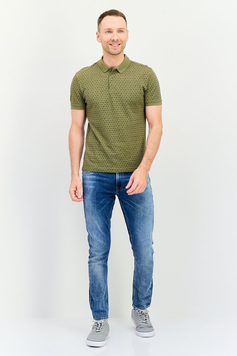 Levi's قميص بولو بأكمام قصيرة للرجال بتصميم مطبوع كامل، متعدد الألوان - Image 4