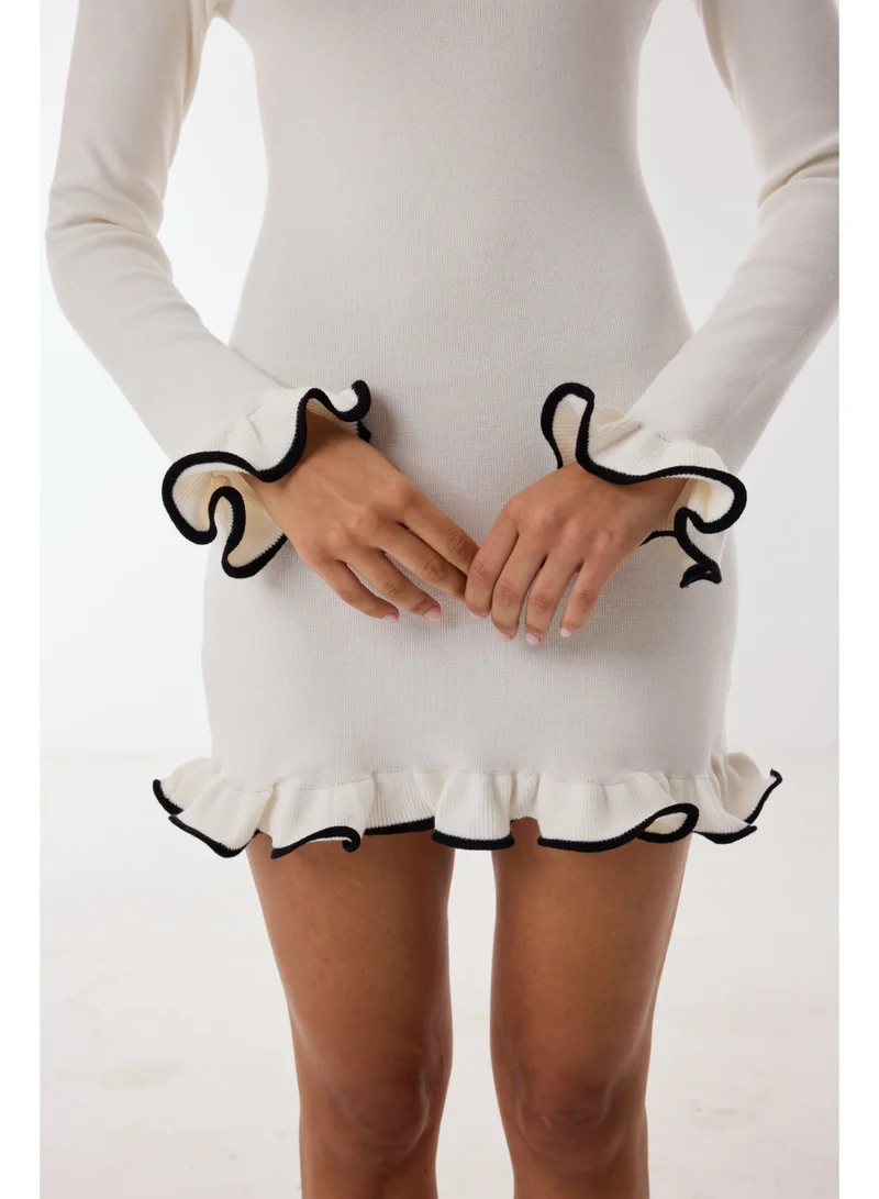Ashita Fernandes  Knit Body-Skimming Short Dress with Boat Neck & Ruffle Sleeves – Ivory/Black for Women | Best Price UAE