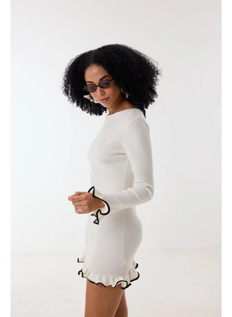 Ashita Fernandes  Knit Body-Skimming Short Dress with Boat Neck & Ruffle Sleeves – Ivory/Black for Women | Best Price UAE