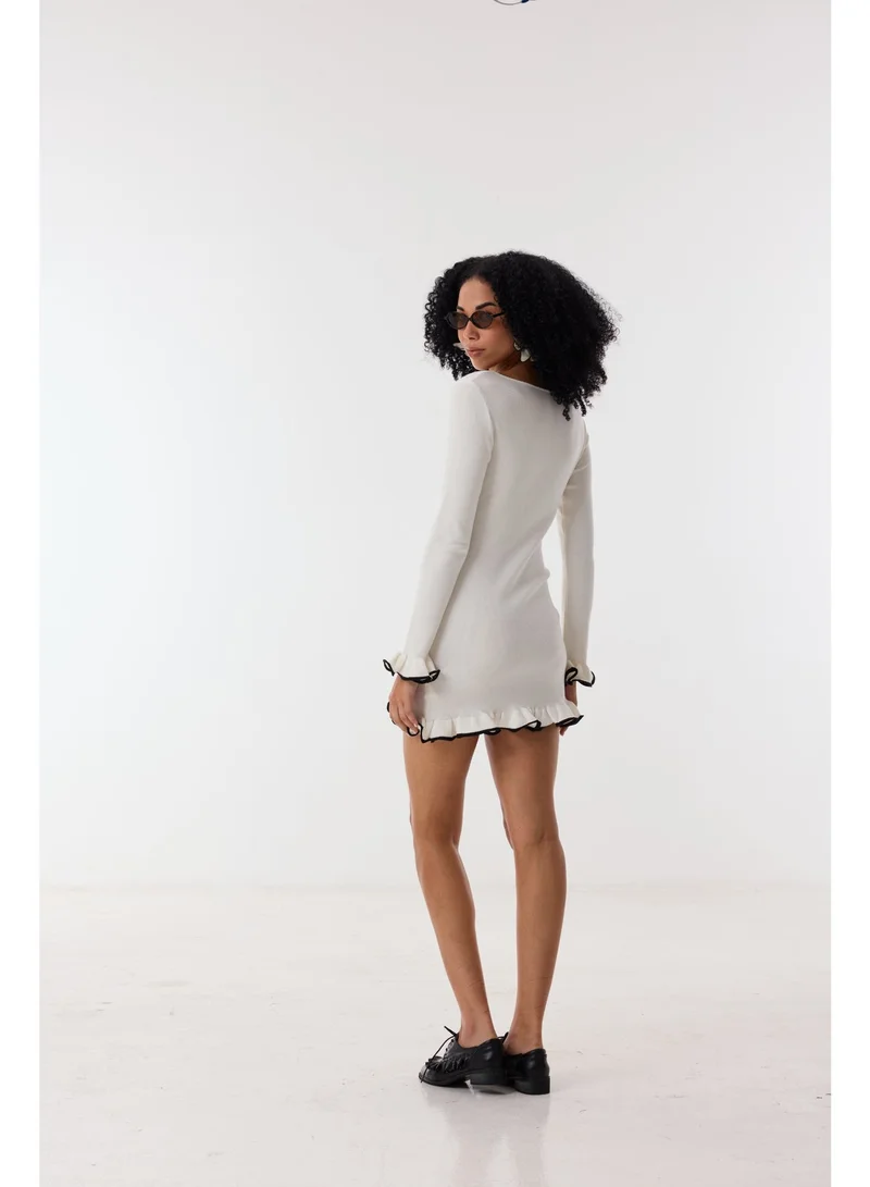 Ashita Fernandes  Knit Body-Skimming Short Dress with Boat Neck & Ruffle Sleeves – Ivory/Black for Women | Best Price UAE
