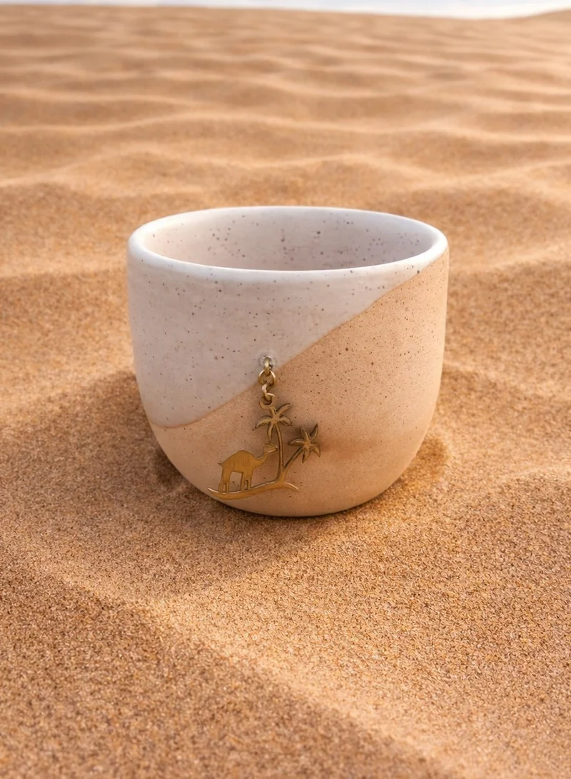 Tohfa Luxe Tohfa Luxe Camel & Palm Handmade Ceramic Coffee Cup – Brass Charm Desert Motif – Sand & White Artisan Drinkware – UAE Souvenir Gift