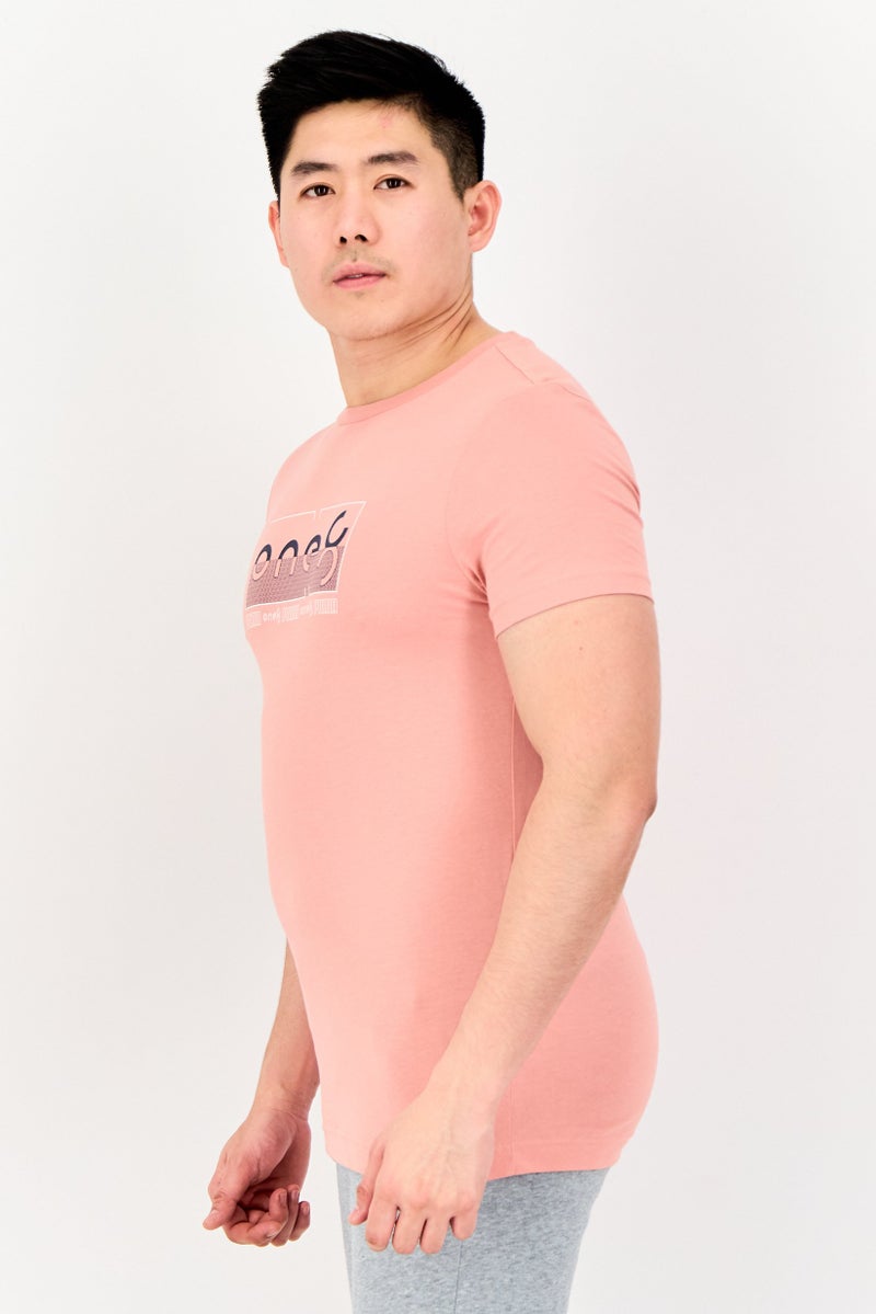 PUMA تي شيرت خارجي قصير الأكمام للرجال من One8 x Puma، وردي باهت - Image 2