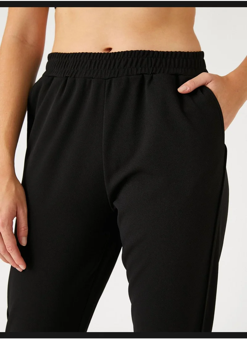 KOTON Elastic Waist Slim Fit Trousers