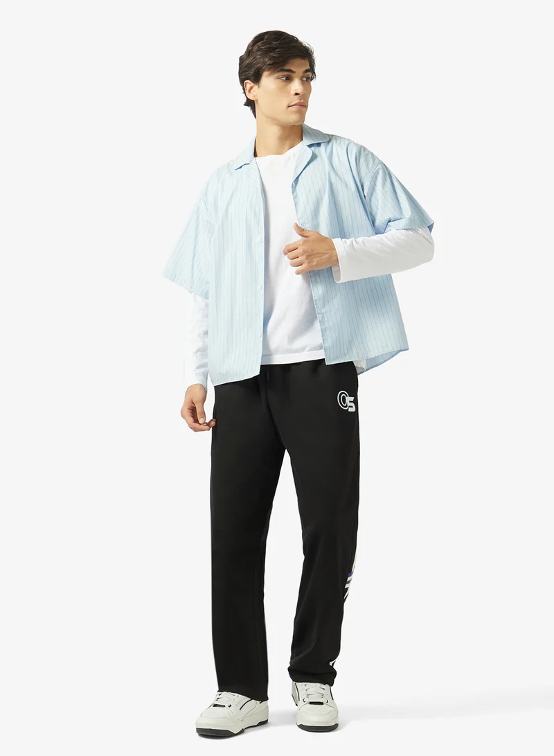 سفنتي فايف بنطلون رياضي فضفاض بتصميم جرافيك