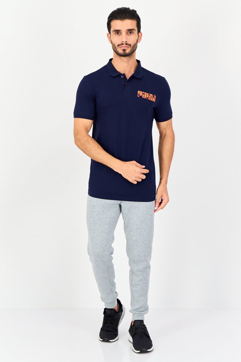 PUMA قميص بولو قصير الأكمام للرجال بتصميم نحيف مع شعار العلامة التجارية، أزرق داكن - Image 4