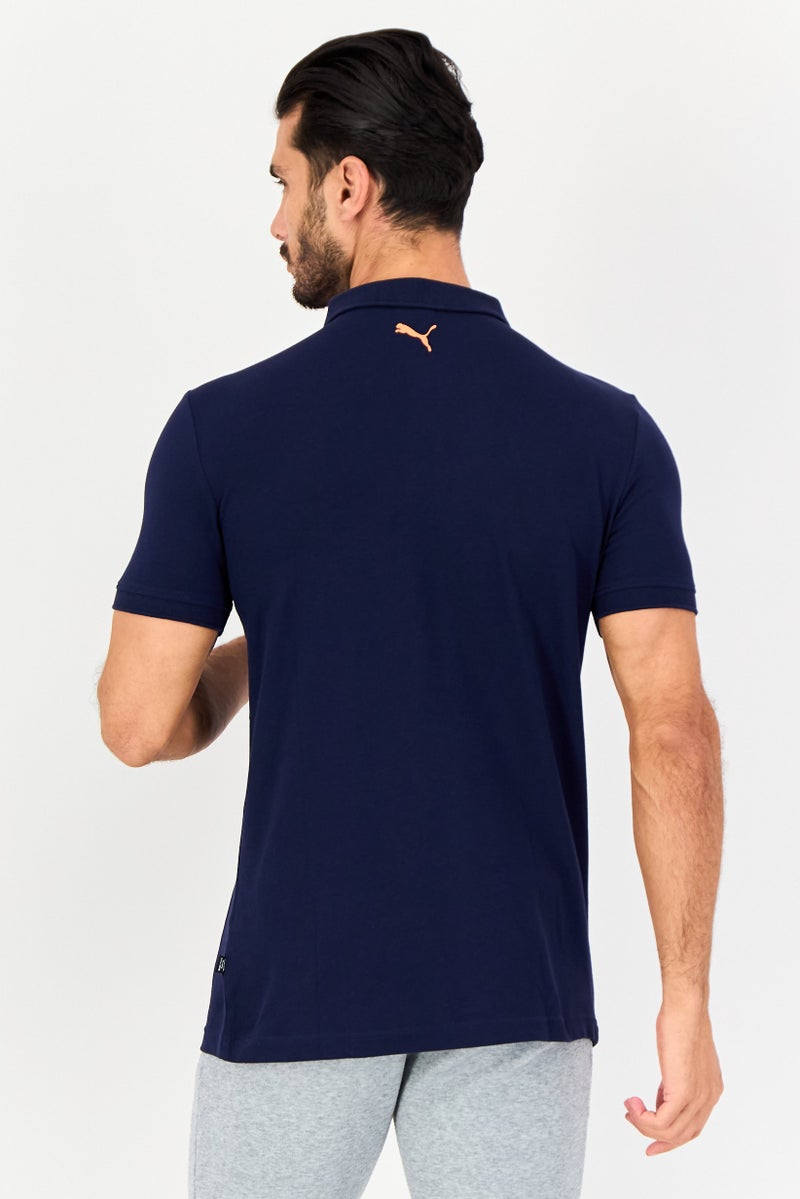 PUMA قميص بولو قصير الأكمام للرجال بتصميم نحيف مع شعار العلامة التجارية، أزرق داكن - Image 2