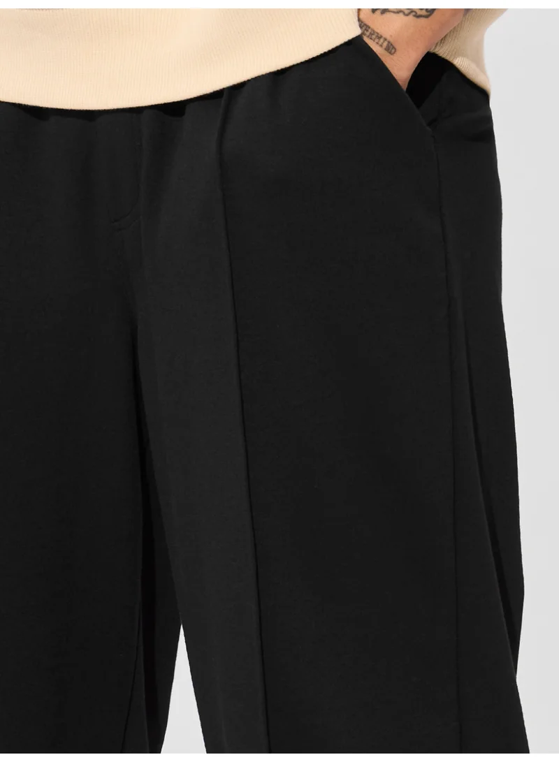 The Souled Store The Souled Store Men Jet Black Solid Baggy Fit Korean Joggers