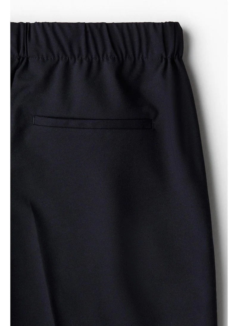 H&M Relaxed Fit Tapered trousers
