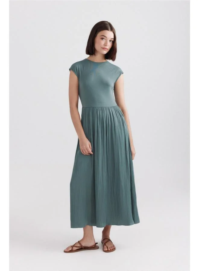 Bimaterial midi dress
