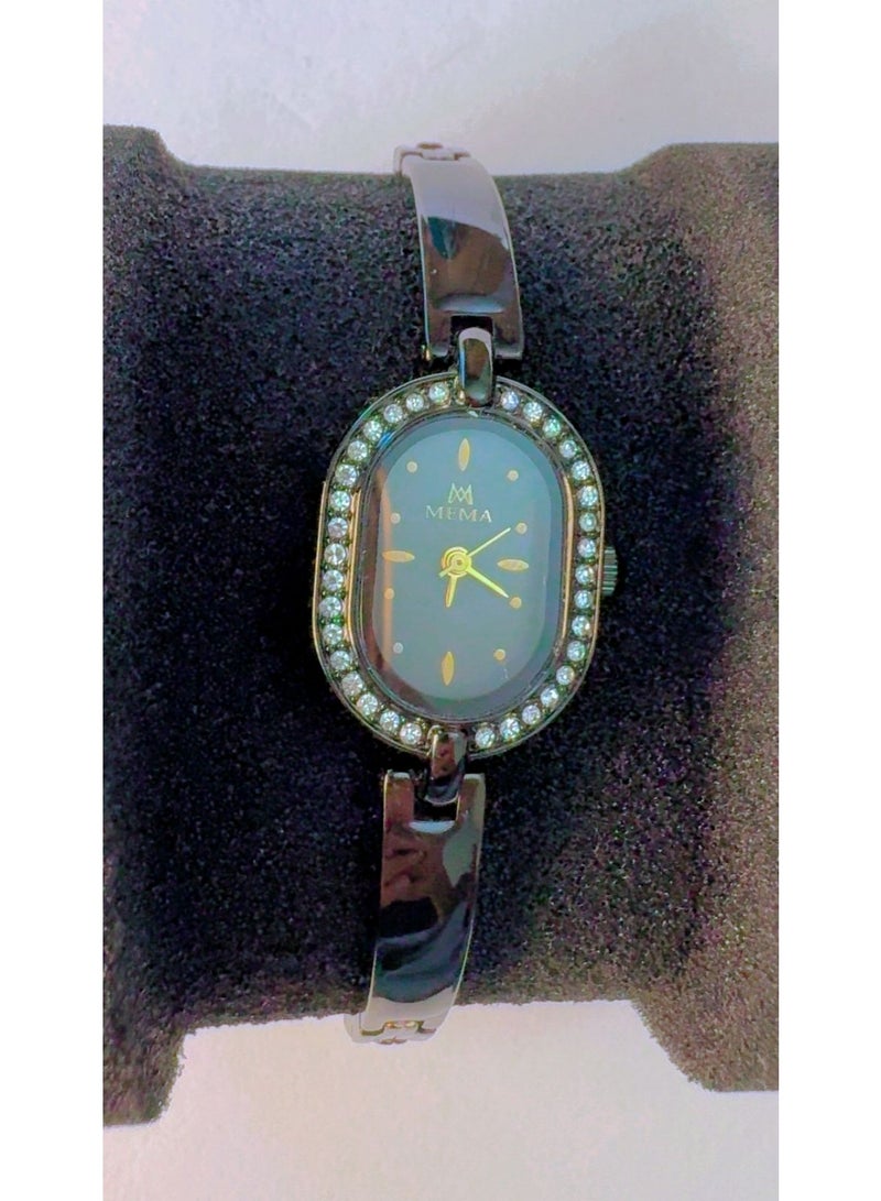 MEMA Women's Black and Gold Oval Dial Watch with Rhinestone Bezel and Black Metal Link Strap - Image 1