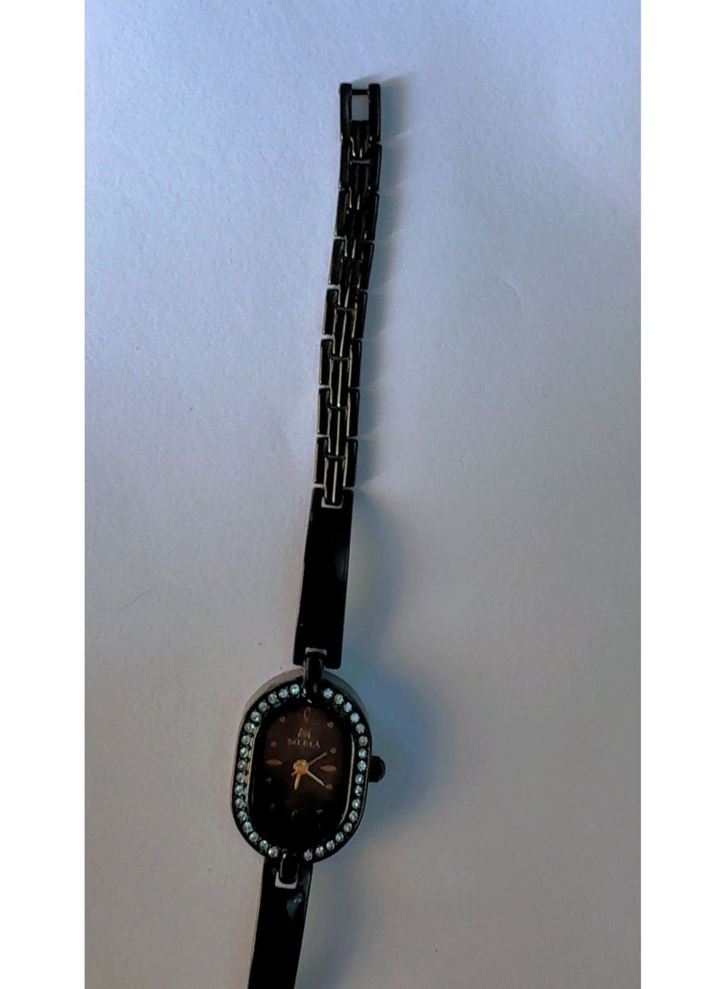 MEMA Women's Black and Gold Oval Dial Watch with Rhinestone Bezel and Black Metal Link Strap - Image 3