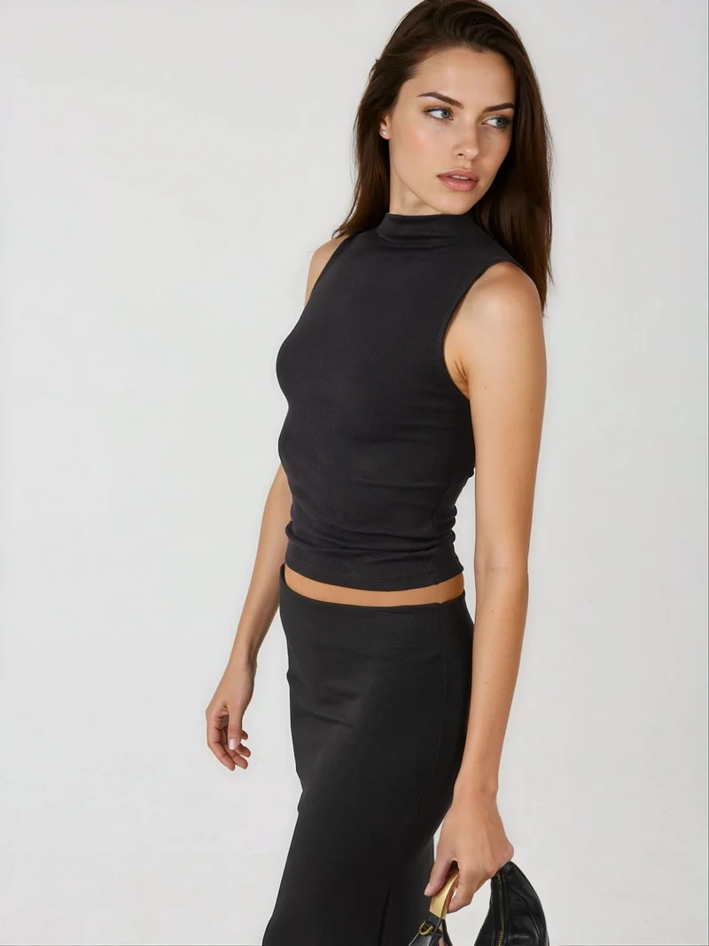 بوسيم بلوزة محبوكة بياقة دائرية بقصة ضيقة من بوستيم