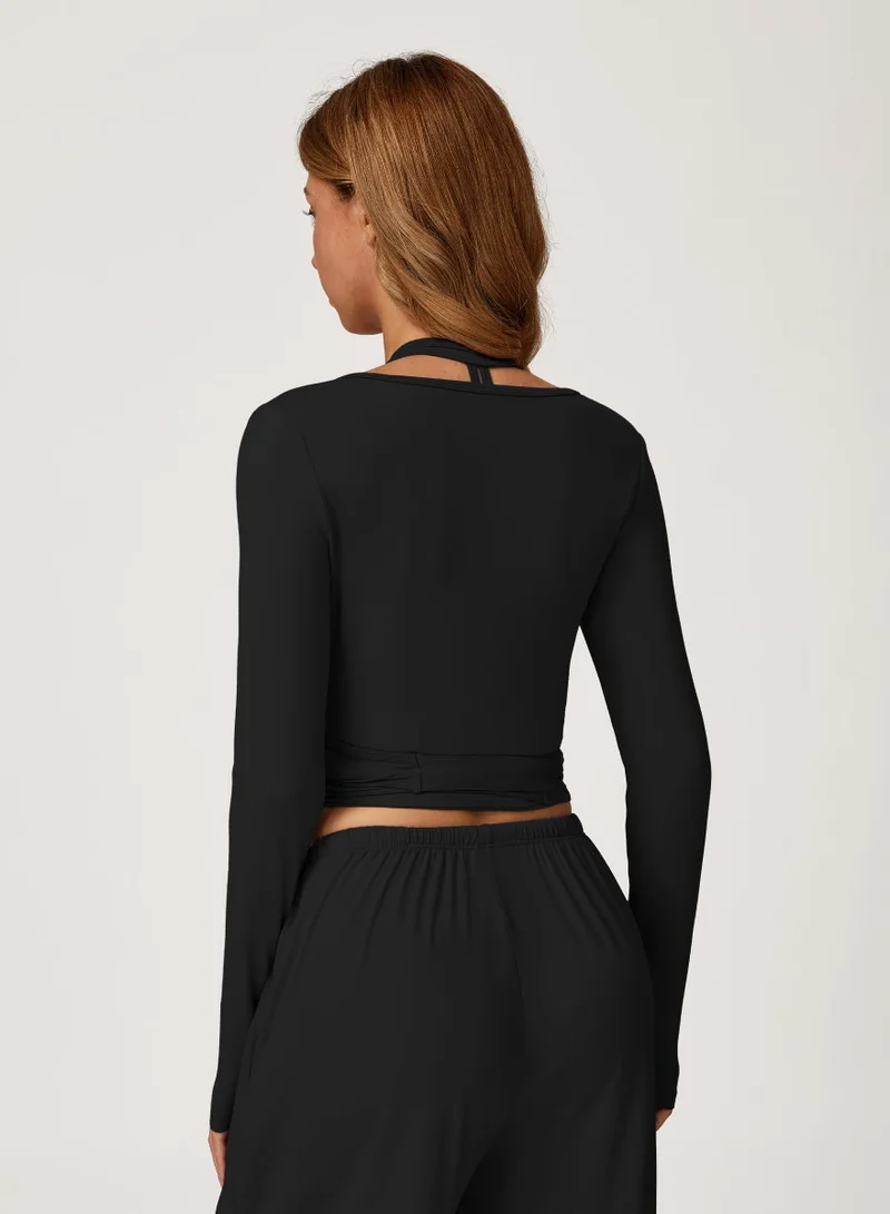 KAWN.YOGA 2 Piece Set Including a V-Neck Halter Bra And A Long-Sleeve Crop Top