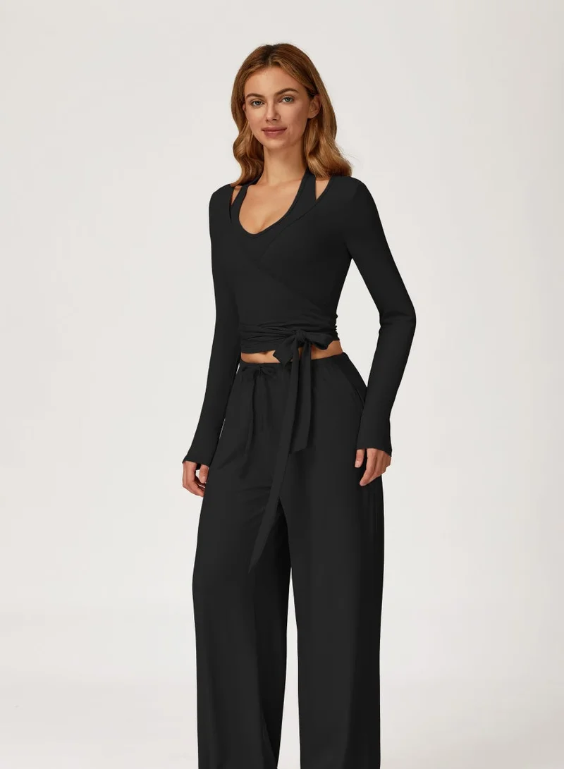 KAWN.YOGA Licorice Black 2 Piece Set Including a V-Neck Halter Bra And A Long-Sleeve Crop Top for Women | Best Price UAE