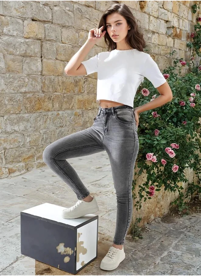 هاي ستار Women Jeans in Black featuring Skinny fit fit with a washed pattern, regular length, secured with button closure, crafted from 70% cotton+28% polyester+2% spandex – designed to make a statement wherever you go.