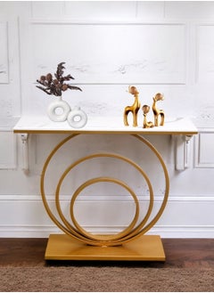 fan baytk The Modern Gold Entryway Table is a piece of furniture that combines elegance and practicality. With dimensions of 110 cm length x 90 cm height x 30 cm width, this entryway provides ideal storage space for everyday items, and can also be used to display flowers or decorative items, adding a distinctive aesthetic touch to any interior space. Its modern design is in harmony with high-quality materials, making it easy to maintain and ensuring that its attractive appearance is maintained. With a unique visual balance between golden iron and marble wood, this entryway is a great attraction that enhances the aesthetics of your home.  - Image 1