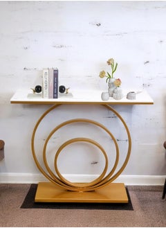 fan baytk The Modern Gold Entryway Table is a piece of furniture that combines elegance and practicality. With dimensions of 110 cm length x 90 cm height x 30 cm width, this entryway provides ideal storage space for everyday items, and can also be used to display flowers or decorative items, adding a distinctive aesthetic touch to any interior space. Its modern design is in harmony with high-quality materials, making it easy to maintain and ensuring that its attractive appearance is maintained. With a unique visual balance between golden iron and marble wood, this entryway is a great attraction that enhances the aesthetics of your home.  - Image 3