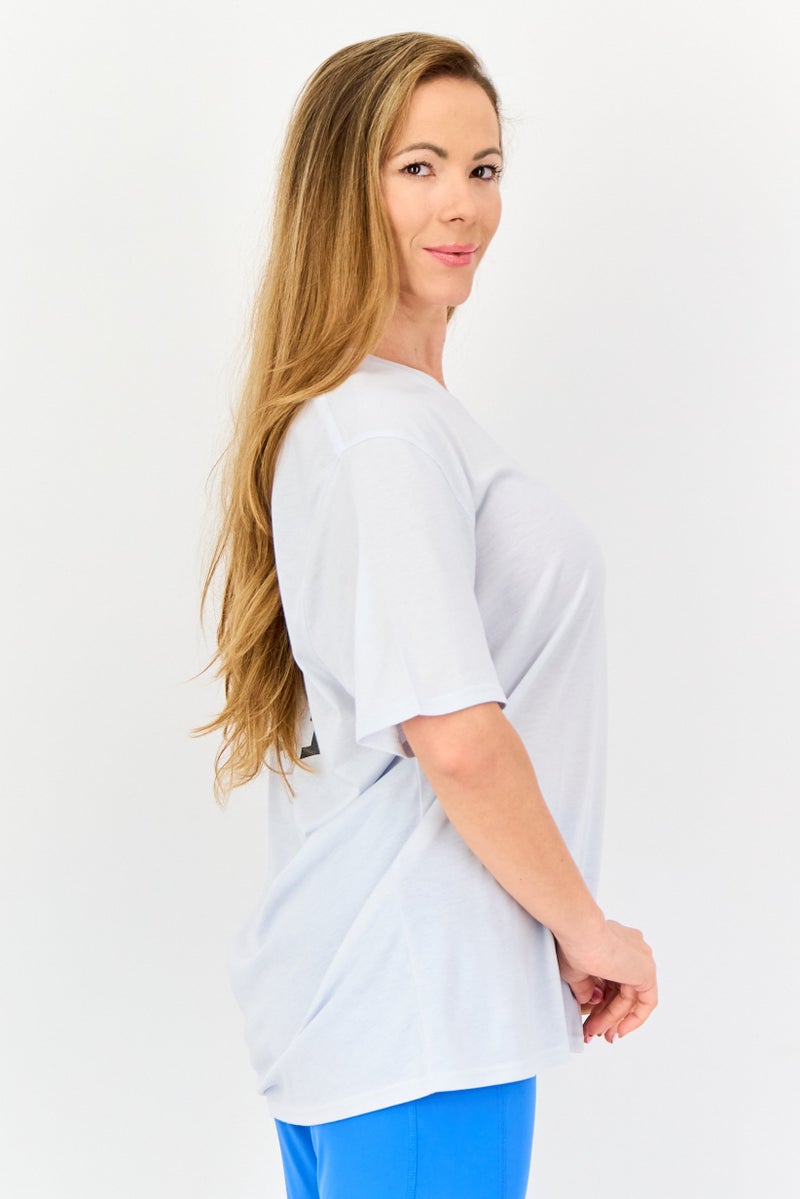 PUMA تي شيرت تدريب قصير الأكمام للنساء، رمادي فاتح - Image 2