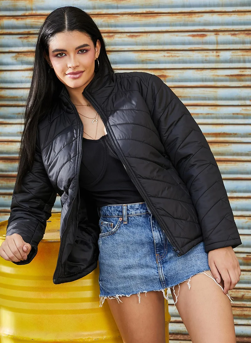 Campus Sutra Women's Onyx Black Chevron Quilted Jacket For Casual Wear | Mock Neck  | Long Sleeve | Zip Closure | Jacket Crafted With Comfort Fit For Everyday Wear