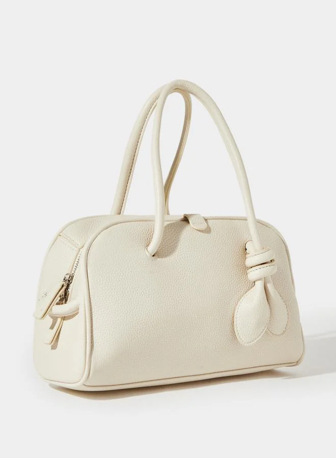 ستايلي Off White Textured Knot Detail Handbag