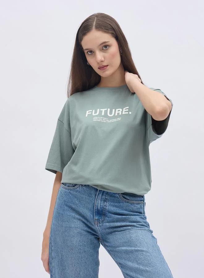 ستايلي Styli Women Green Slogan Print Short Sleeve Oversized T-Shirt