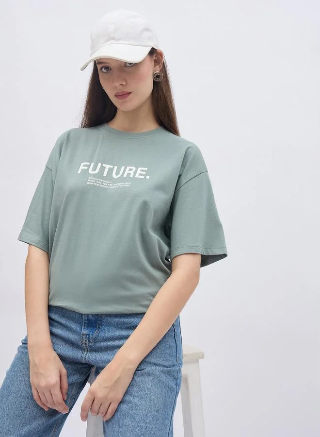 Styli Styli Women Green Slogan Print Short Sleeve Oversized T-Shirt