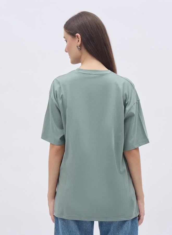 Styli Styli Women Green Slogan Print Short Sleeve Oversized T-Shirt