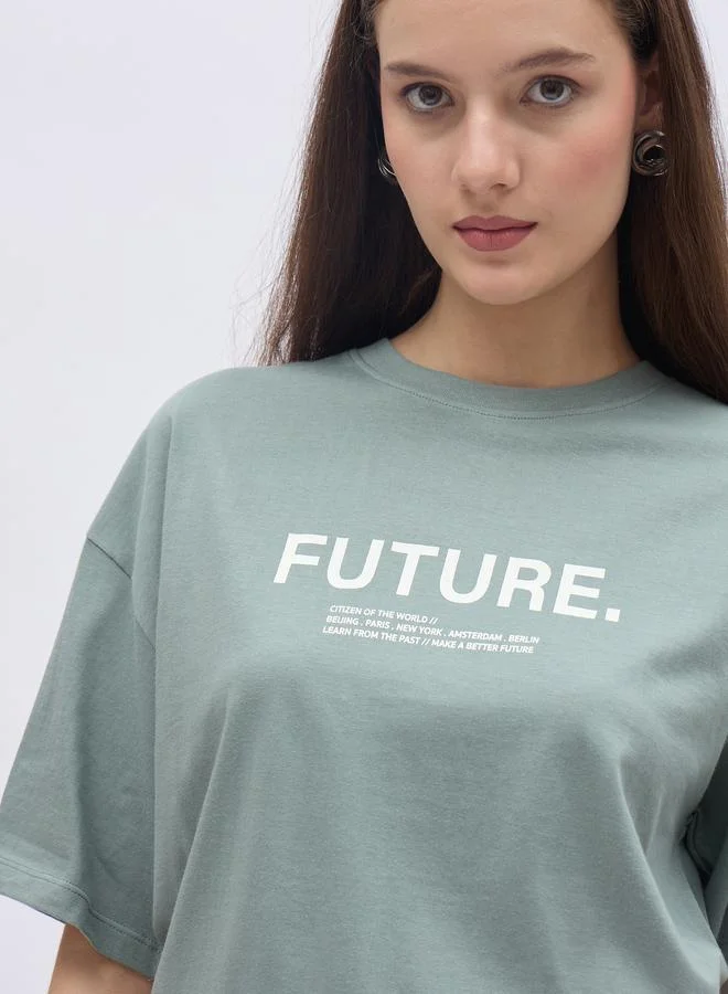 Styli Styli Women Green Slogan Print Short Sleeve Oversized T-Shirt