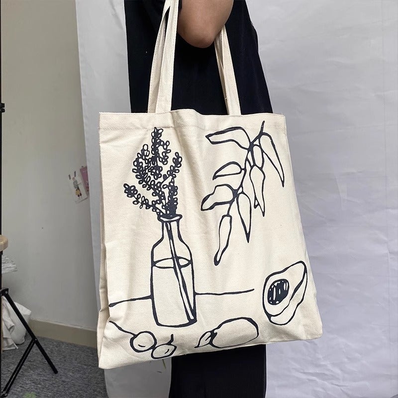 Women's Canvas Tote Bag with Leaf and Bottle Print - Image 3