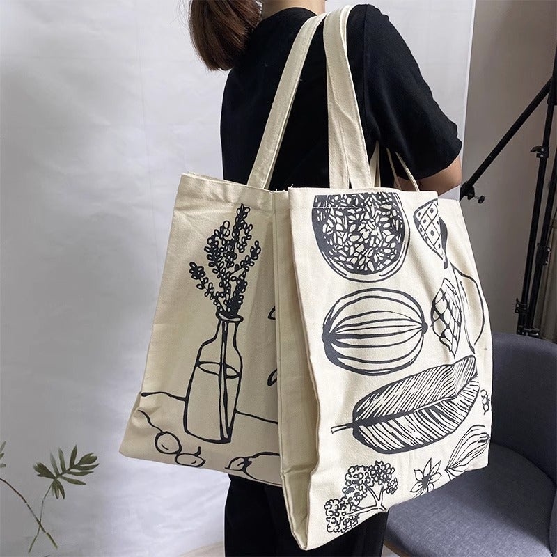 Women's Canvas Tote Bag with Leaf and Bottle Print - Image 1
