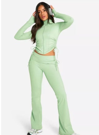 Vicino Women's 2-Piece Activewear Set: Long Sleeve Sweatshirt with Side Tie and Long Front Zip and Wide Leg Pants with a Distinctive Workout Look - Light Green - pzsku/Z406957A201CD36EFF012Z/45/_/1735464260/2c0b5a98-589e-417b-9ab8-c997abef222a