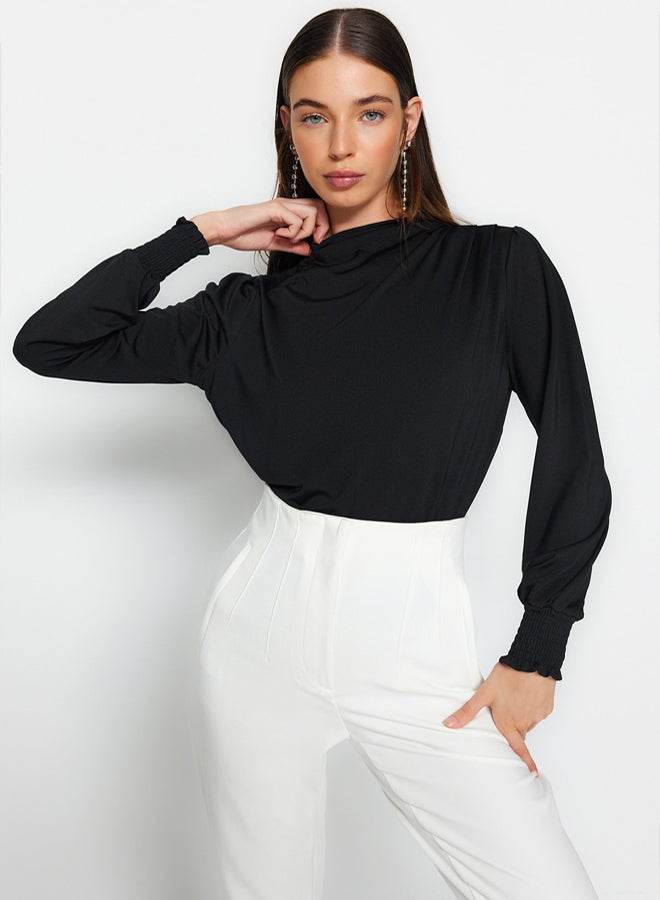 trendyol Black High Collar Regular Fit Gipe Detailed Flexible Knitted Blouse - Image 1