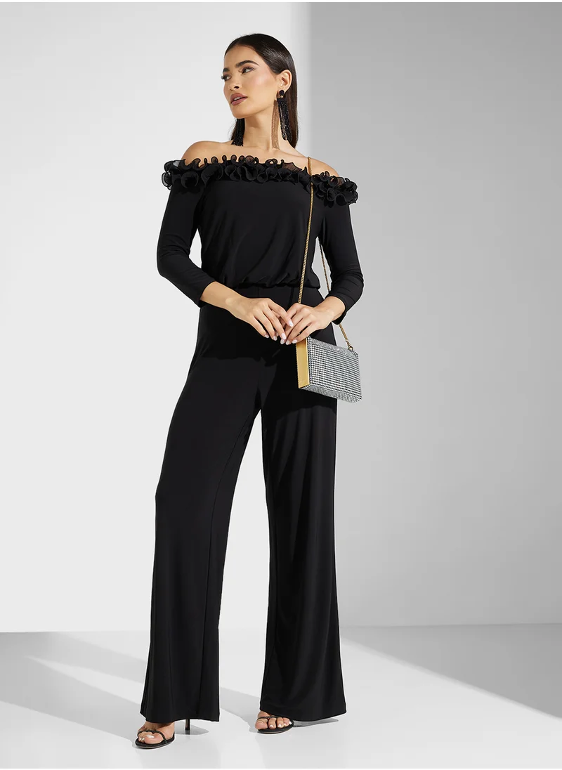 ادريانا بابيل Off Shoulder Ruffled Jumpsuit