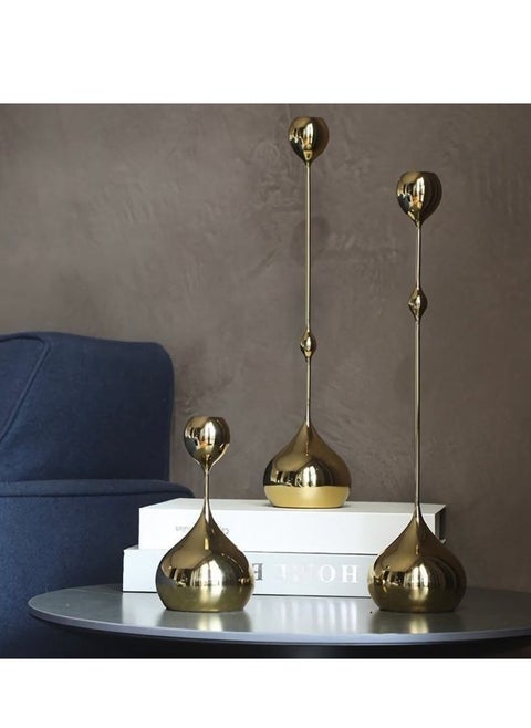 A triple candlestick set in a new and different shape Gilded