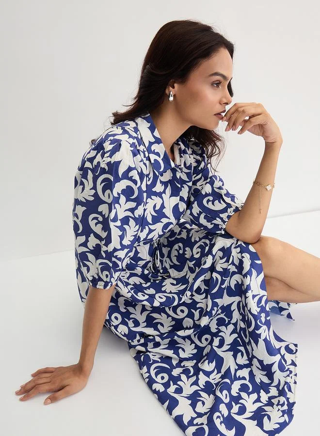 Femmella Blue Abstract Printed Waist Tie Midi Dress