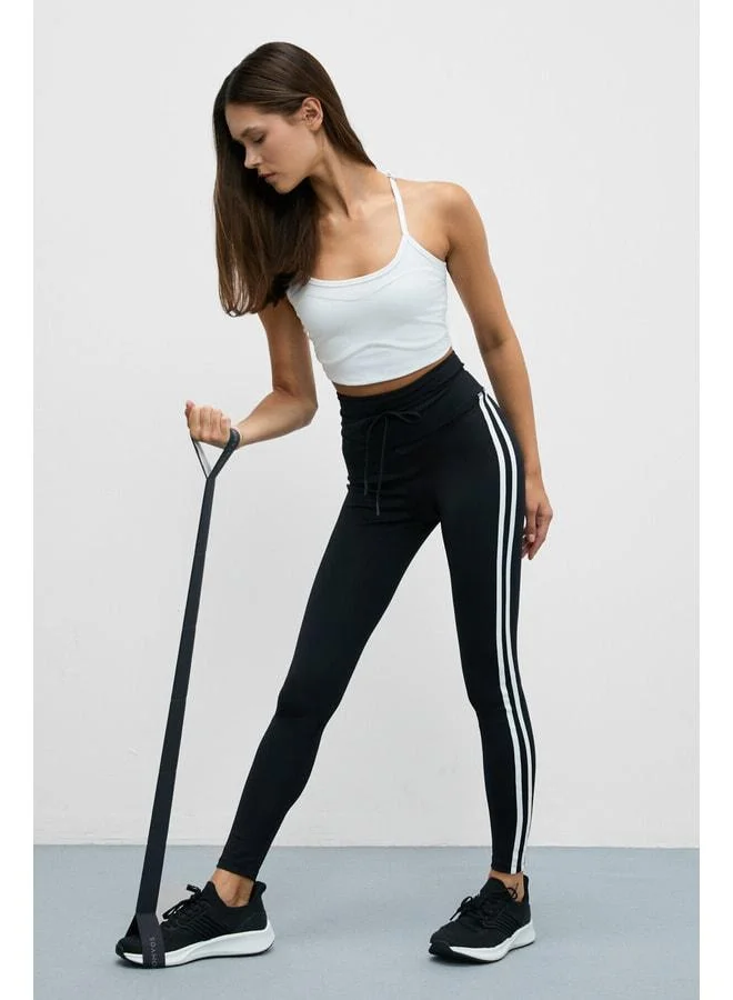 Urban Beat NORGIA Women's Soft and Stretchy Textured Contrast-Piped Drawstring Black-and-White Leggings.