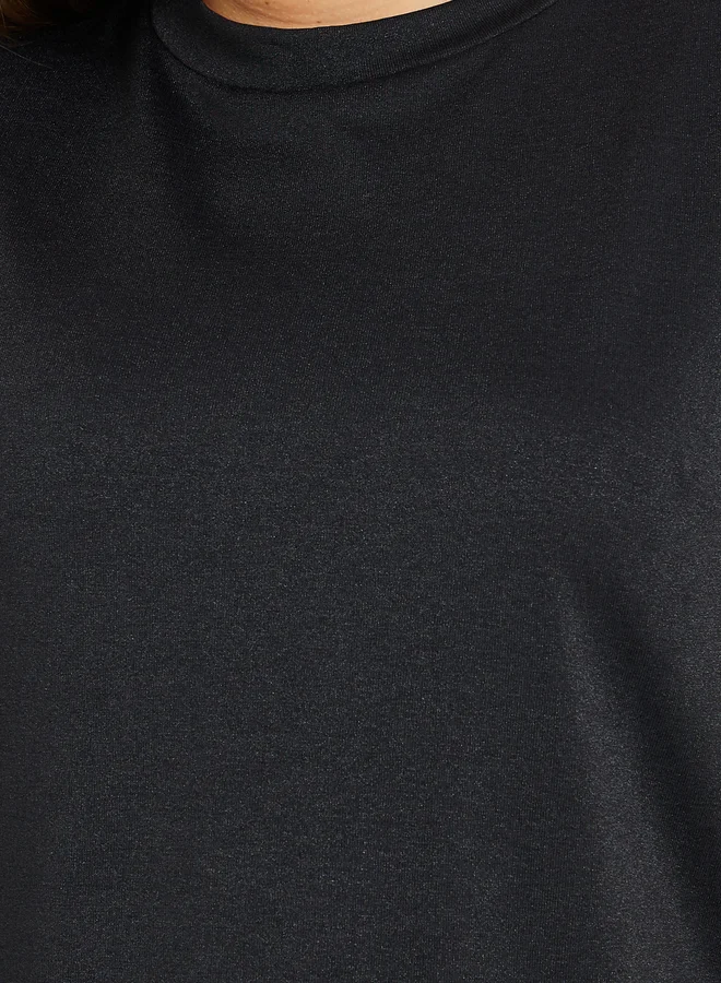 ستايلي طقم تي شيرت بحافة غير متماثلة وبنطلون واسع من Styli Plus Size
