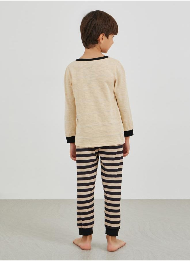 Styli Styli Graphic Print Round Neck T-Shirt and Striped Pyjama Set  - Image 4