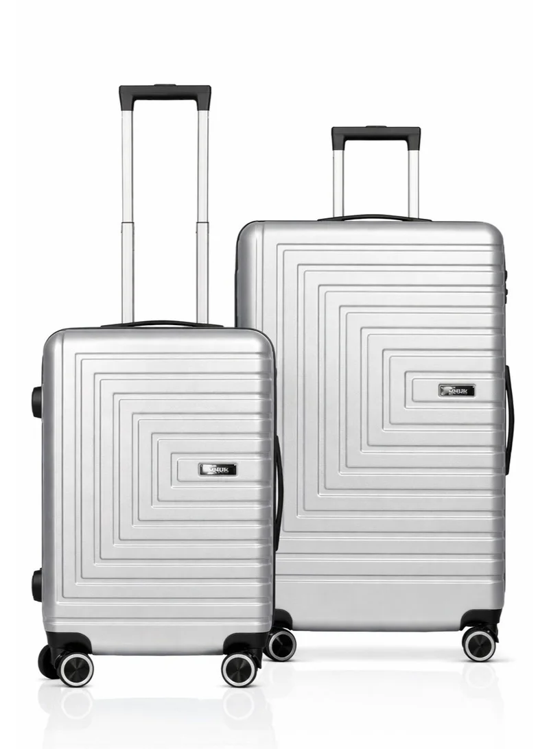 منيك مجموعة حقائب سفر صلبة من قطعتين من Pilgrimage | حقيبة مقصورة 20 بوصة + حقيبة متوسطة 24 بوصة | قفل TSA، عجلات مزدوجة دوارة 360°، مقبض ناعم | فضي