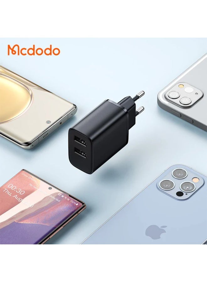 Mcdodo Dual Port 12W Charger CH-507 , 2.4A fast charging per port with intelligent power distribution, safe design with heat and fire resistant materials, supports charging two devices simultaneously safely and low heat, compatible with all iPhone and Android devices and ideal for travel thanks to its support for global voltage 110-240V  - Image 4