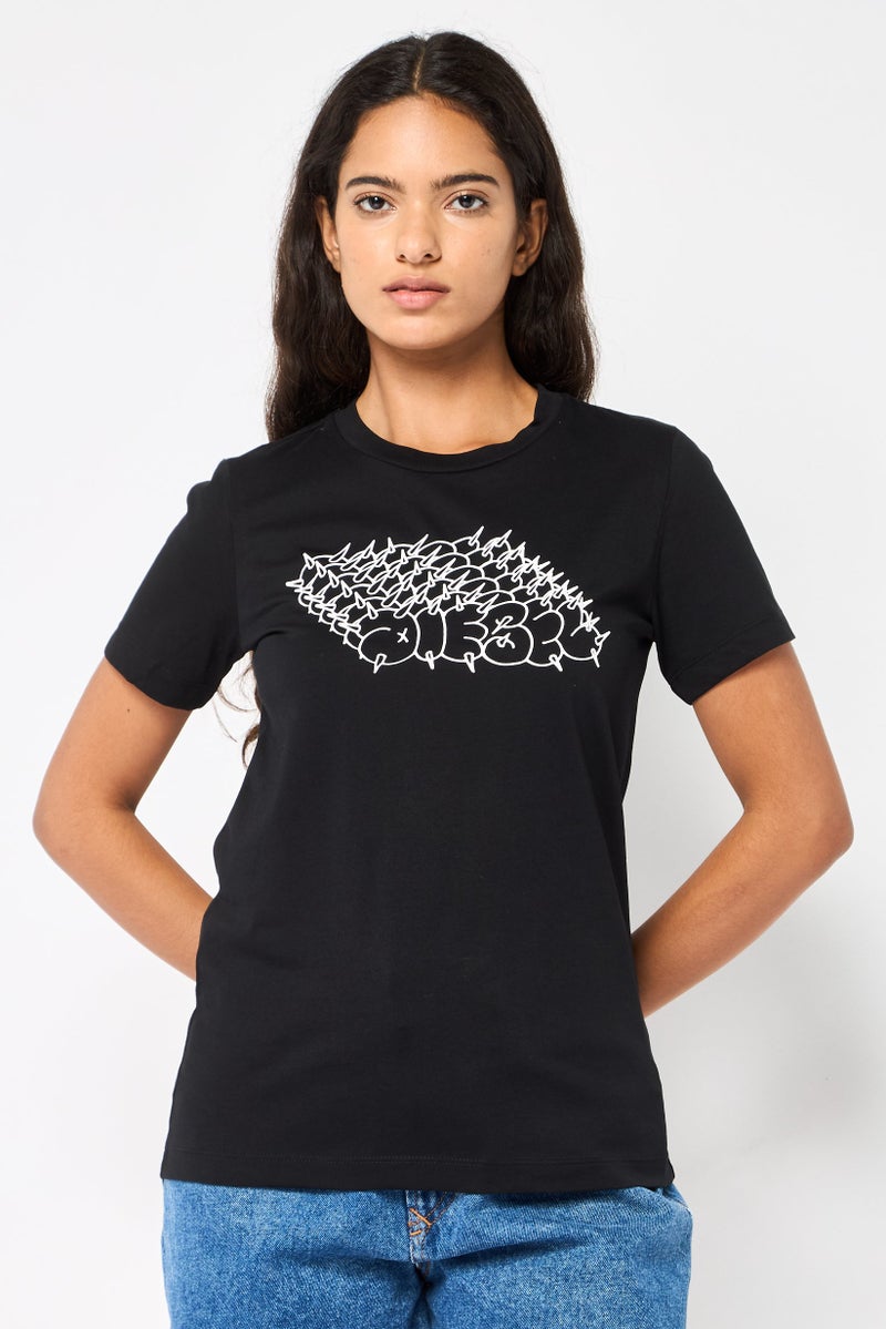DIESEL تي شيرت نسائي بأكمام قصيرة وياقة دائرية، مطبوع برسومات، أسود - Image 1