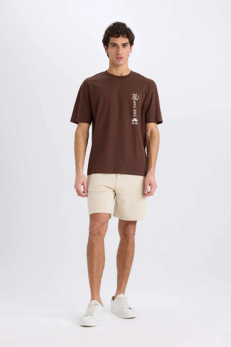 ديفاكتو Boxy Fit Crew Neck Short Sleeve T-Shirt