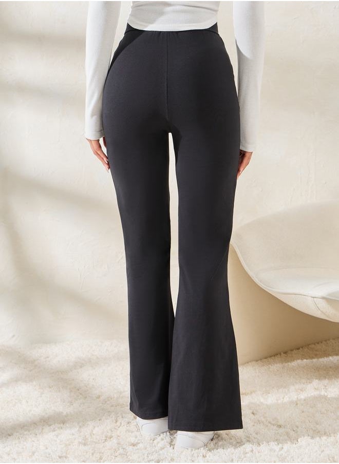 Styli Solid Criss-Cross Waistband Fit & Flare Leggings  - Image 4