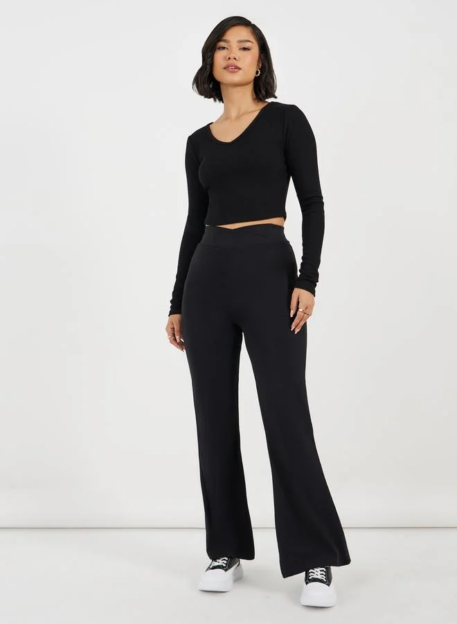Styli Solid Criss-Cross Waistband Fit & Flare Leggings