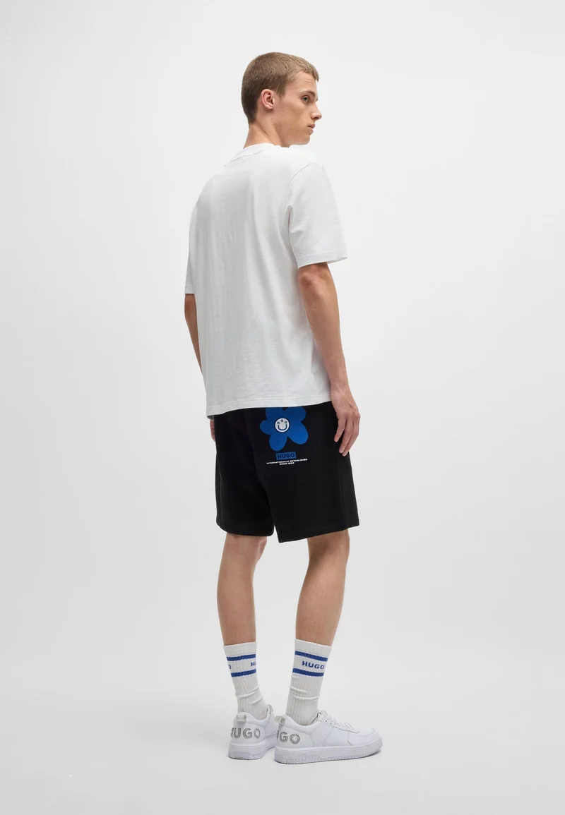 HUGO Regular-fit cotton-jersey T-shirt with blue logo patch