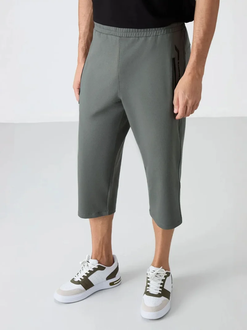 تومي لايف TOMMY Men's Capri Cycling Shorts