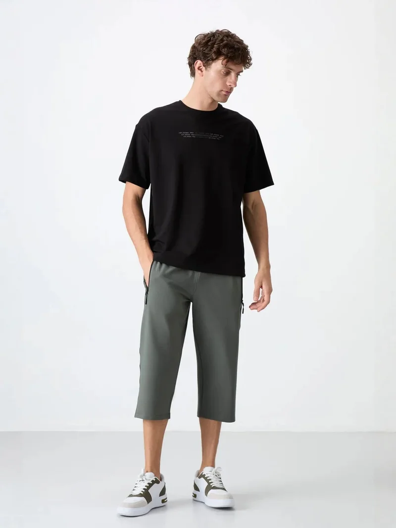 تومي لايف TOMMY Men's Capri Cycling Shorts
